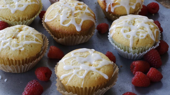 Lemon raspberry pound cake muffins are well suited to dessert, but also would be fine for an indulgent breakfast.