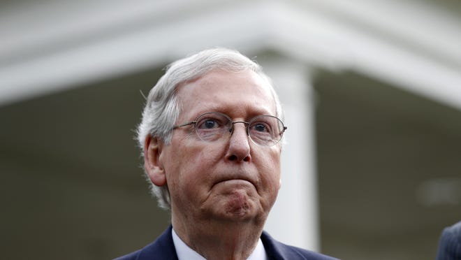 Senate Majority Leader Mitch McConnell of Ky., listens to a question while speaking with the media after he and other Senate Republicans had a meeting with President Donald Trump at the White House, Tuesday, June 27, 2017, in Washington. (AP Photo/Alex Brandon)
