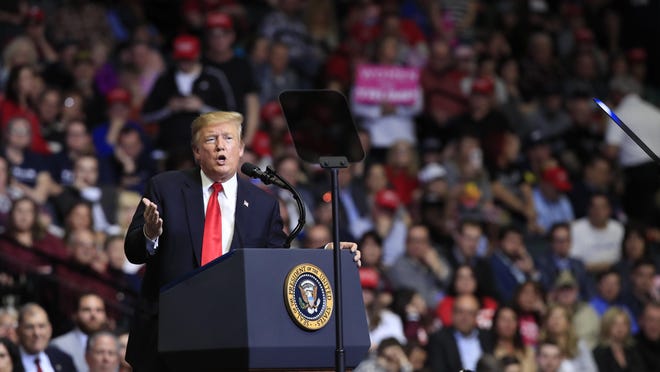 In this March 28, 2019, photo, President Donald Trump speaks at a campaign rally in Grand Rapids, Mich. (AP Photo/Manuel Balce Ceneta)