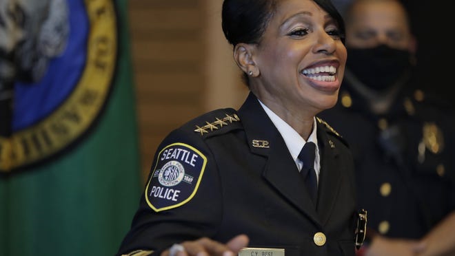 Seattle Police Chief Carmen Best laughs during a light moment at a news conference Tuesday in Seattle.