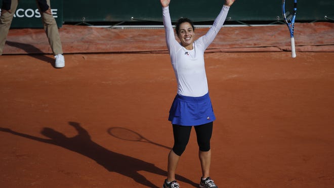 Martina Trevisan celebrates her victory over Kiki Bertens, 6-4, 6-4, at the Roland Garros stadium in Paris on Sunday.
