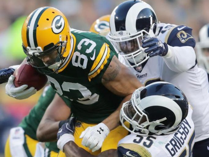 Green Bay Packers wide receiver Jeff Janis is tackled