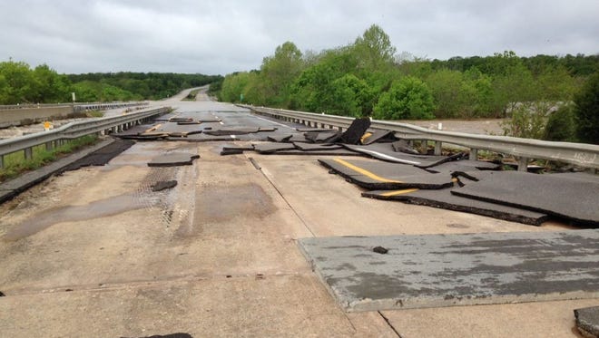 A Missouri Department Transportation photo of a portion of Interstate 44 near Hazelgreen shared on Monday showed broken asphalt left behind following flooding.