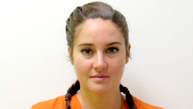 Shailene Woodley is seen in her police booking photo following her arrest for protesting at a Dakota Access Pipeline  construction site. She was charged with criminal trespass and engaging in a riot, the Morton County Sherrif's office said.
