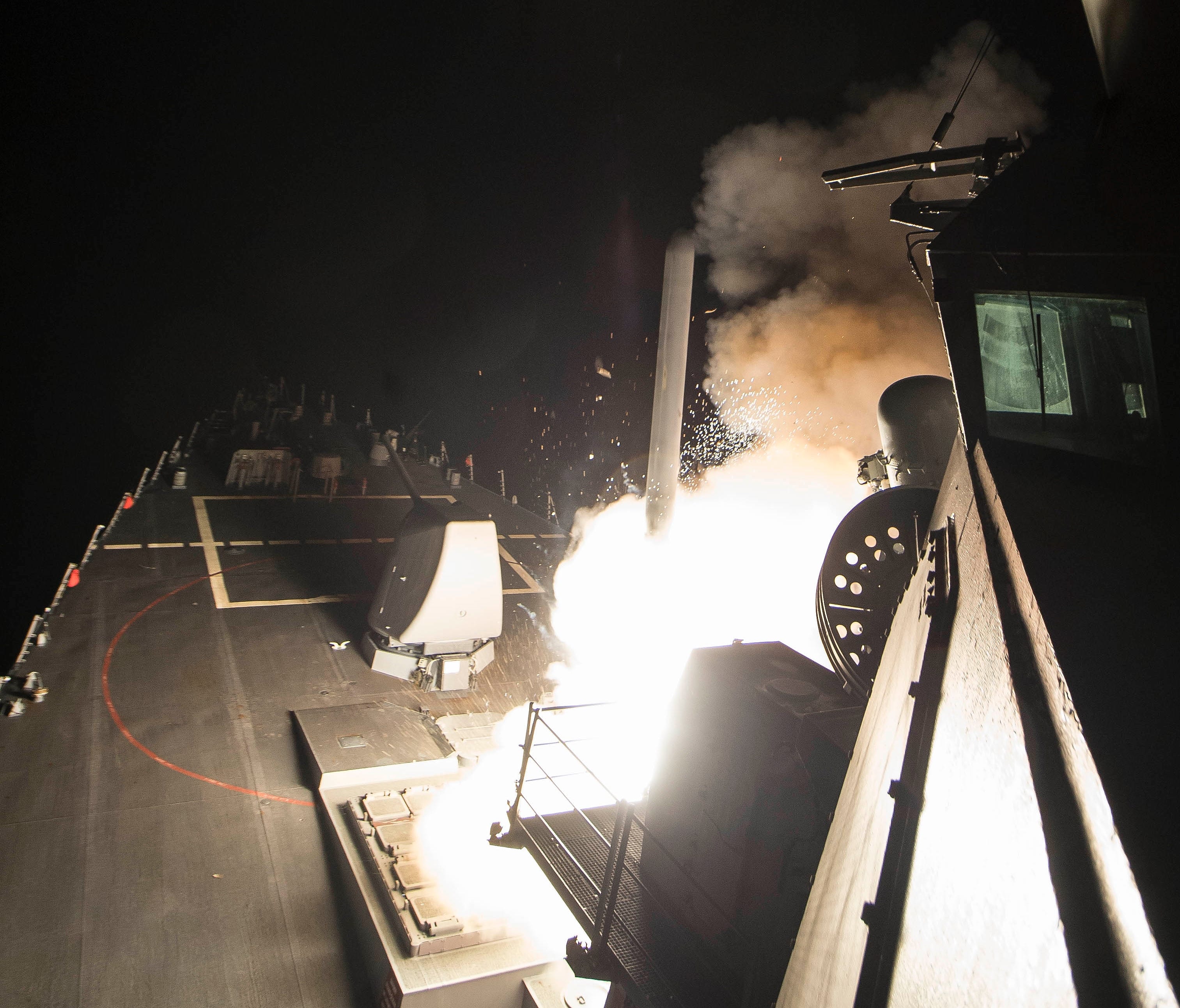 USS Ross (DDG 71) fires a tomahawk land attack missile towards Syria. USS Ross, an Arleigh Burke-class guided-missile destroyer, forward-deployed to Rota, Spain, is conducting naval operations in the U.S. 6th Fleet area of operations in support of U.
