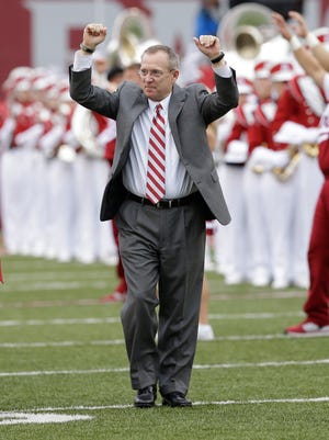 Arkansas athletic director Jeff Long walks onto the field before a football game in Fayetteville, Ark.