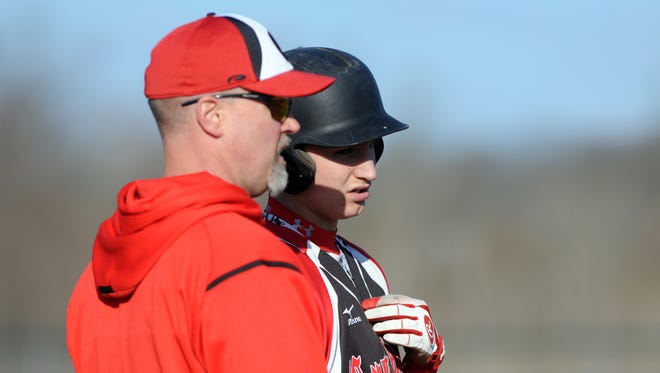 Crooksville coach Shawn Chamberlin talks to a player during a game several years ago. Chamberlin, the long-time baseball coach and current Athletic Director, was tabbed the new boys basketball coach recently.