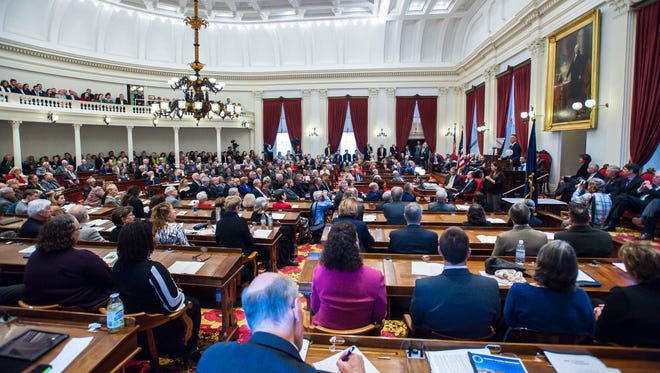 Members of the Vermont House of Representatives and Senate listen to Gov. Phil Scott's inaugural address on Thursday, January 5, 2017.