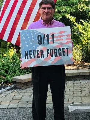Thanks to Yanks founder Michael Shain will stand outside a Wendy's restaurant Friday morning holding signs reading, "9/11 Never Forget." He will be joined by his 83-year-old mother and another volunteer from Thanks to Yanks, a local nonprofit founded in 2006 to honor local military members, veterans and first responders. Thanks to Yanks' annual 9/11 tribute dinner was canceled due to the conronavirus pandemic.