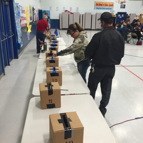 Voters cast ballots Feb. 23 at the Republican cauc
