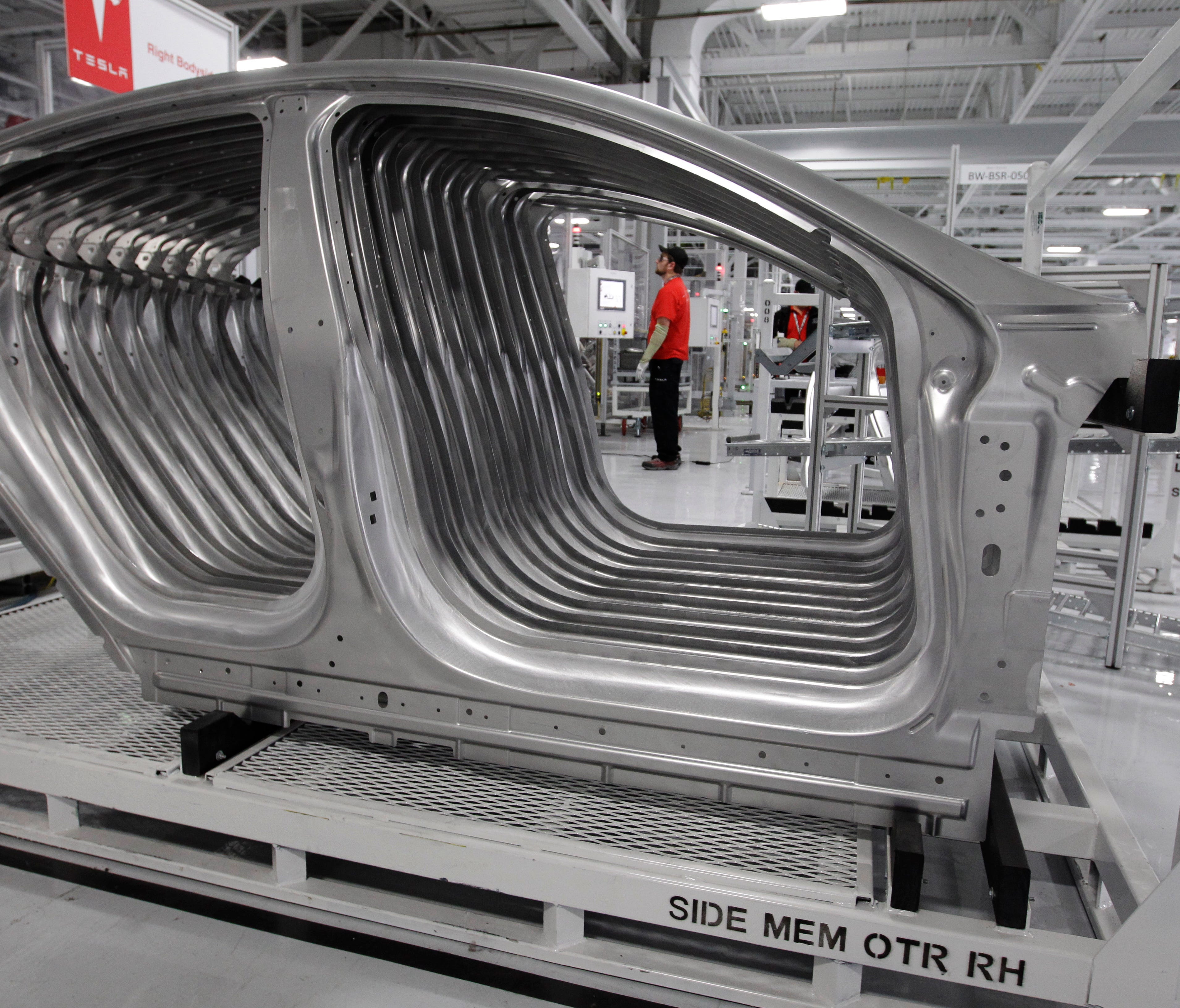 Tesla Model S frames are shown in the assembly area at the Tesla factory in Fremont, Calif., on June 22, 2012.