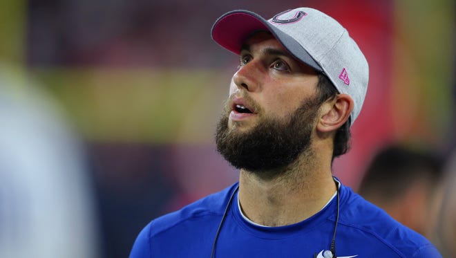 Indianapolis Colts quarterback Andrew Luck (12) looks up to the video board to watch a replay during the second half of an NFL football game Thursday, Oct. 8, 2015, at NRG Stadium in Houston, Texas.