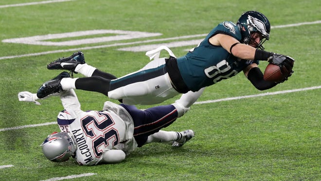 Philadelphia Eagles tight end Zach Ertz scores the winning touchdown on an 11-yard reception over New England's Devin McCourty in the fourth quarter of Super Bowl LII.