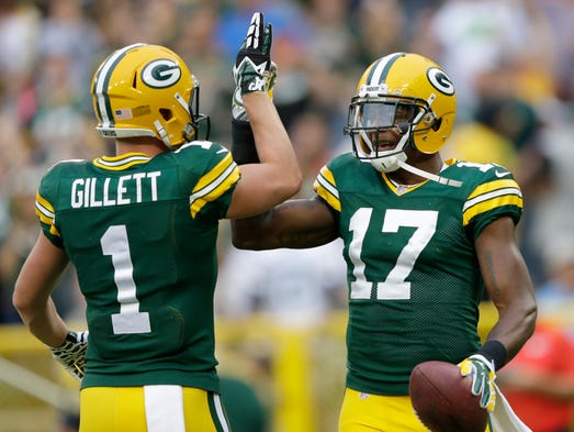 Green Bay Packers wide receiver Alex Gillett (1) congratulates