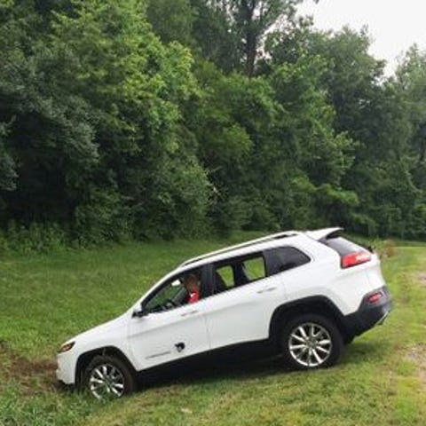 A Jeep Cherokee winds up in a dtich after hackers 