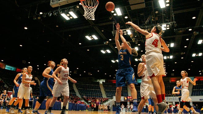Ansley Davenport gets an easy basket inside during NewCath's 59-27 win over Livingston Central in the State All A Classic in Frankfort, Wednesday, January 27, 2016.