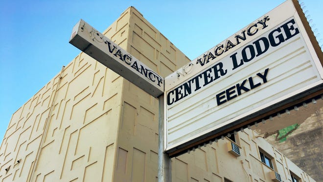 The Center Lodge, a vacant weekly hotel, has been stripped of all value.