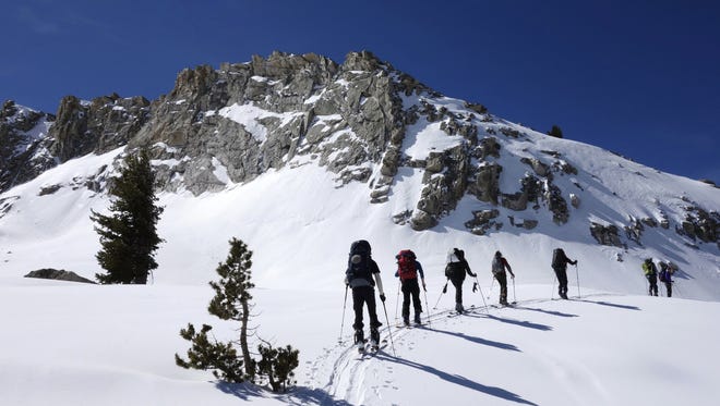 A group of skiers ascends a peak in Sequoia National Park in March, 2016. Research reviewed by scientists at Colorado State shows snow-based and other forms of recreation has negative effects on wildlife.