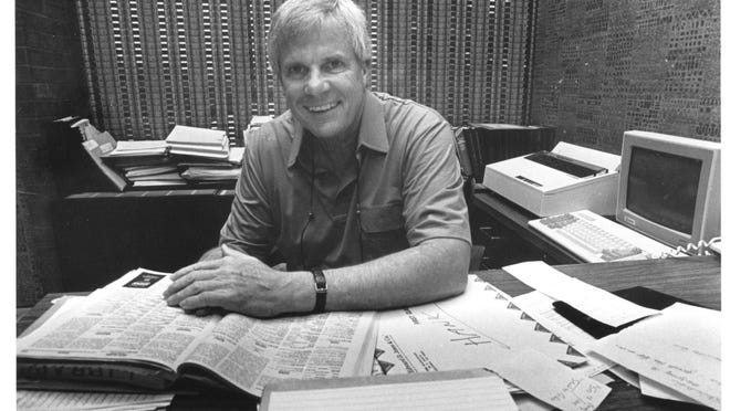 Tribune publisher Hank Waters at his desk in the 1980s.