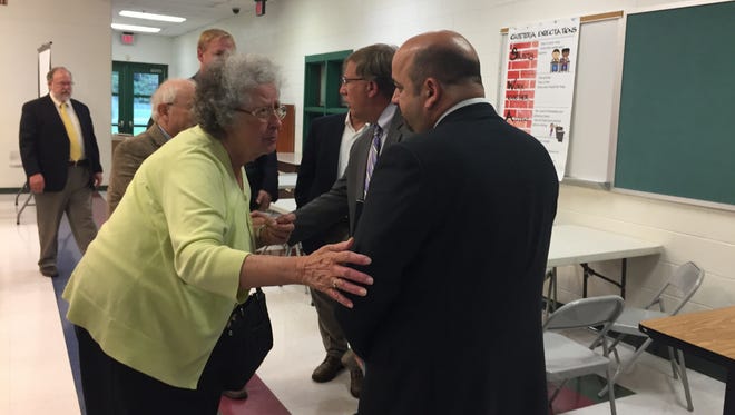 Parksley resident Betty Richardson talks with Ed Heckler, Riverside Health System vice president, after a special meeting of the Accomack County Board of Supervisors in Parksley, Virginia on Monday, Aug. 28, 2017. The meeting was called to discuss the announced closing of Riverside Shore Rehabilitation Center in Parksley.