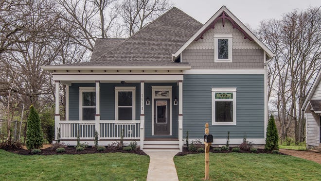 Jennifer and Donnie LeBlanc moved into their new home, an early 1900s-style house built by Aerial Development Group in Shelby Hills, last March.