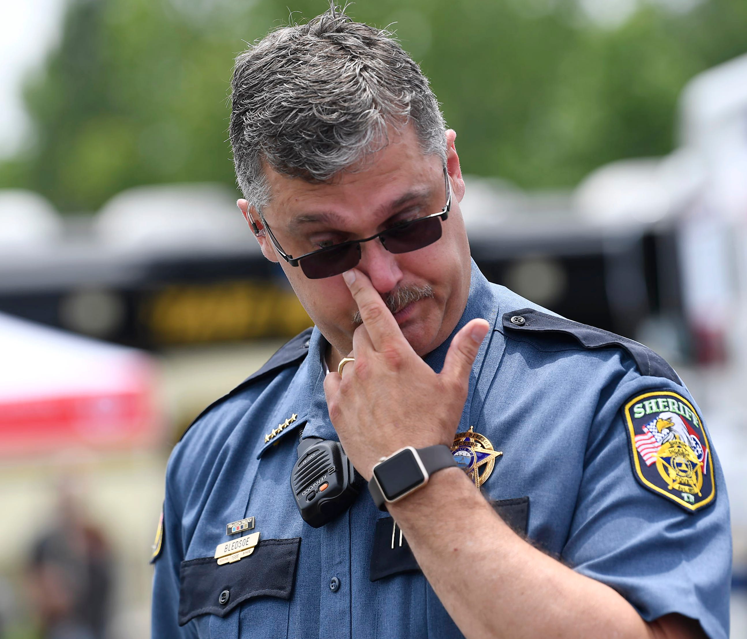 Dickson County Sheriff Jeff Bledsoe pauses during a press conference as he talks about Sgt. Daniel Baker who was shot and killed Wednesday, May 30, 2018. Authorities are searching for a suspect, according to the Tennessee Highway Patrol.