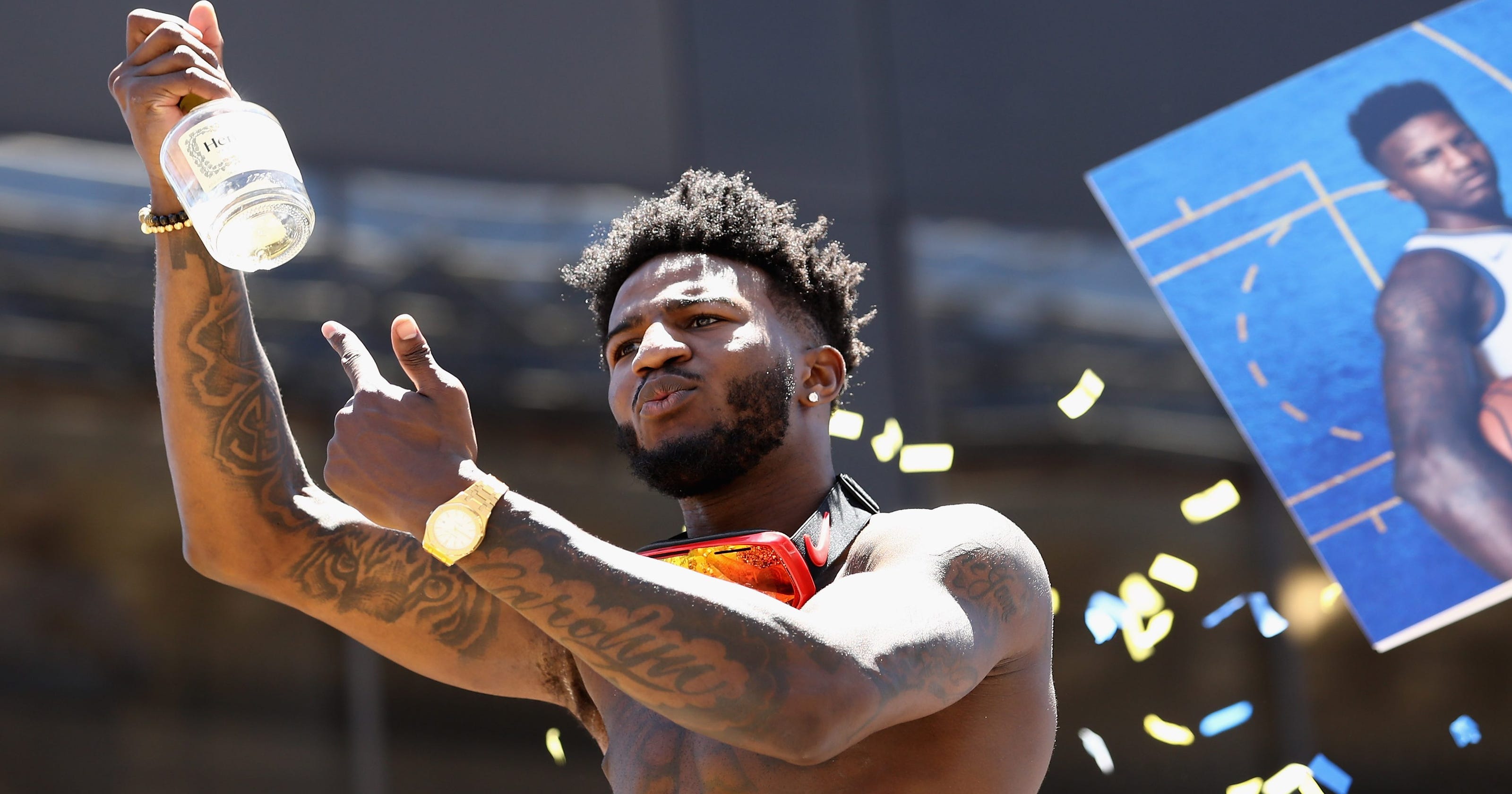 Jordan Bell receives lots of Hennessy after running out at parade