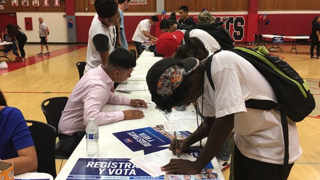 Students register to vote at Central High School in Phoenix on Sept. 27, 2016.
