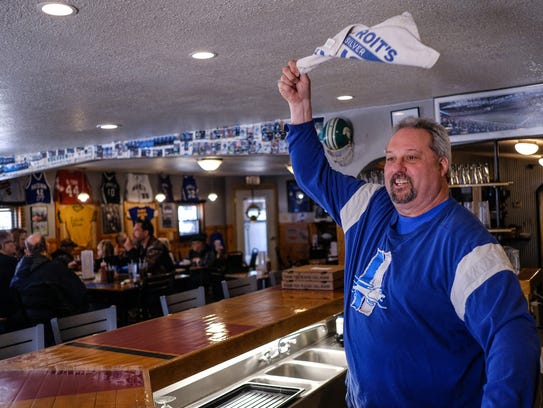Yooperman's Bar and Grill owner Donnie Stefanski waves