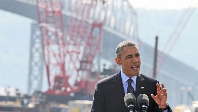 With the Tappan Zee Bridge as a backdrop, President Barack Obama speaks from the Washington Irving Boat Club in Tarrytown, N.Y., on May 14.