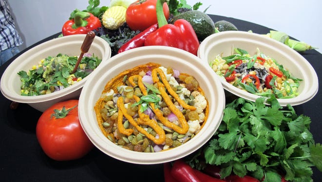 Delicious Raw recently introduced three fusion bowls - from left, border fusion, Romesco and pad Thai noodle bowls.