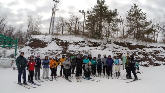 The Weekday Skiers Club poses for a group photo atop Elk Mountain in the Poconos last year.