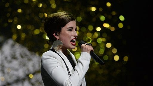 In this Thursday photo, singer Ann Sophie performs to take the second place during the final for the German qualification for the 60th Eurovision Song Contest 2015 in Hanover, Germany. Ann Sophie will represent Germany at the ESC in Vienna in May, after winner Andreas Kuemmert refused travel to Vienna.