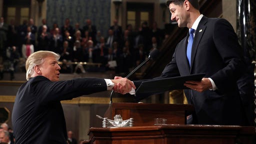 President Donald Trump shakes hands with House Speaker Paul Ryan of Wis., as he arrives on Capitol Hill in Washington, Tuesday, Feb. 28, 2017, for his address to a joint session of Congress. (Jim Lo Scalzo/Pool Image via AP)