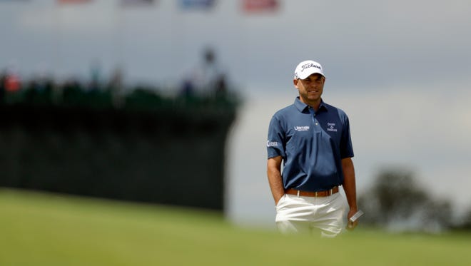 In this June 18, 2017, file photo, Bill Haas looks over the first hole during the fourth round of the U.S. Open golf tournament, at Erin Hills in Erin, Wis. Haas returns to golf this week knowing the Valspar Championship will be unlike any of the previous 347 times he has played on the PGA Tour. He is playing for the first time since he was the passenger in a car accident that killed the driver in Los Angeles.