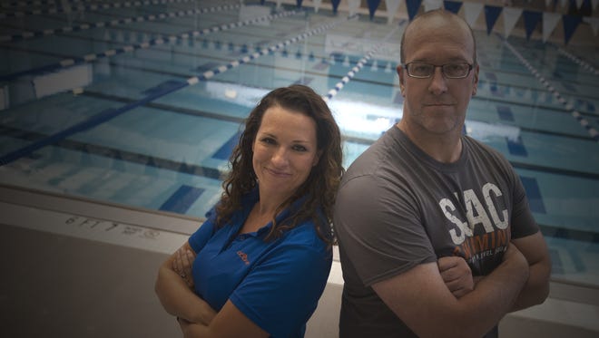 Owners Peter and Kristen Holcroft near the Olympic pool at the new Next Level (NL) Aquatic Center at the old Voorhees Coliseum.