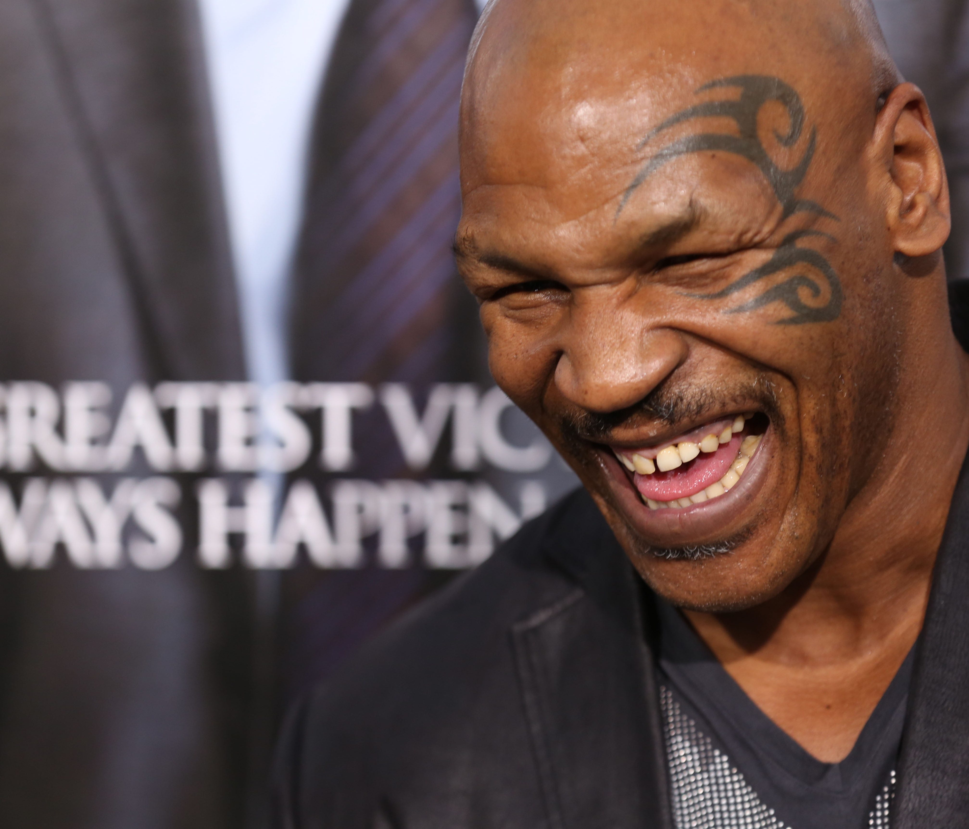 Mike Tyson arrives at the premiere of 