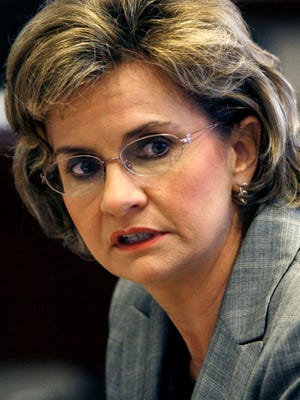 In this Dec. 13, 2006 photograph, then-Mississippi Lt. Gov. Amy Tuck speaks before a Joint Legislative Budget Committee in Jackson. Tuck, now a Mississippi State University vice president, shut down her campaign committee in the closing days of 2013, and took the $158,342 remaining in the account, which is allowed by law. Mississippi is one of five states where withdrawals are legal so long as state and federal income taxes are paid, with no restrictions on how it’s spent.