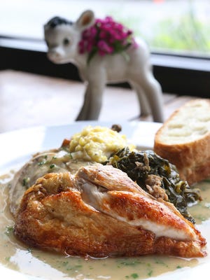 Sunday Sitdown at Eiderdown has Barr Farms roasted chicken, collard greens with sausage, grits, roasting jus. 
July 12, 2016