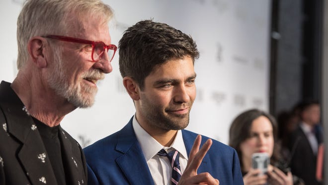 21c owner Steve Wilson and and his guest actor Adrian Grenier are seen on the black carpet at the Vanity Fair Derby party at 21c Museum Hotel. May 6, 2016