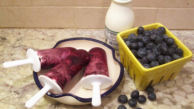 Blueberry and cream popsicles in New York. This dish is from a recipe by Sara Moulton.