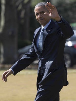 President Barack Obama waves as he leaves the White House in Washington, D.C., on Wednesday, March 18, 2015.
