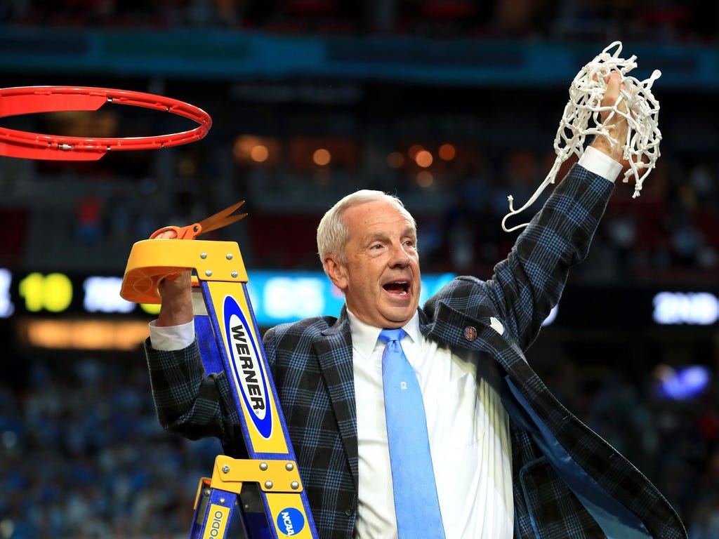 Head coach Roy Williams of the North Carolina Tar Heels cuts down the net after defeating the Gonzaga Bulldogs during the 2017 NCAA Men's Final Four National Championship game at University of Phoenix Stadium on April 3, 2017, in Glendale, Ariz. The 