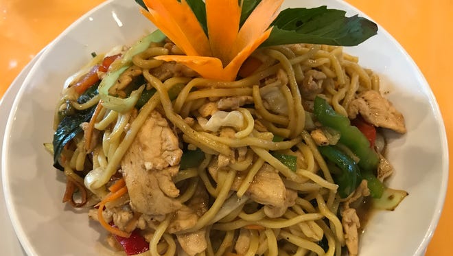 Ginger Thai Bistro in Murfreesboro: Basil lo-mein has bell peppers, onions, cabbage, carrots and basil.