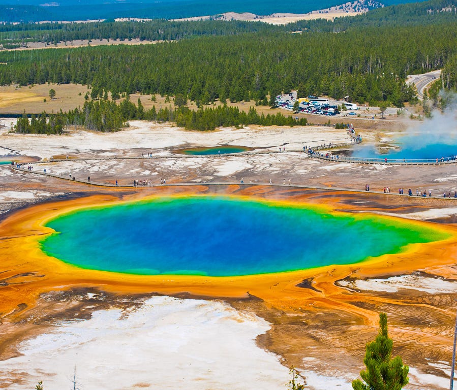 Wyoming: Yellowstone National Park is a natural bucket list destination when you visit Wyoming, and there are places in the park you won't want to miss. Old Faithful Geyser will be on your itinerary, but you'll want to see Grand Prismatic Spring, too