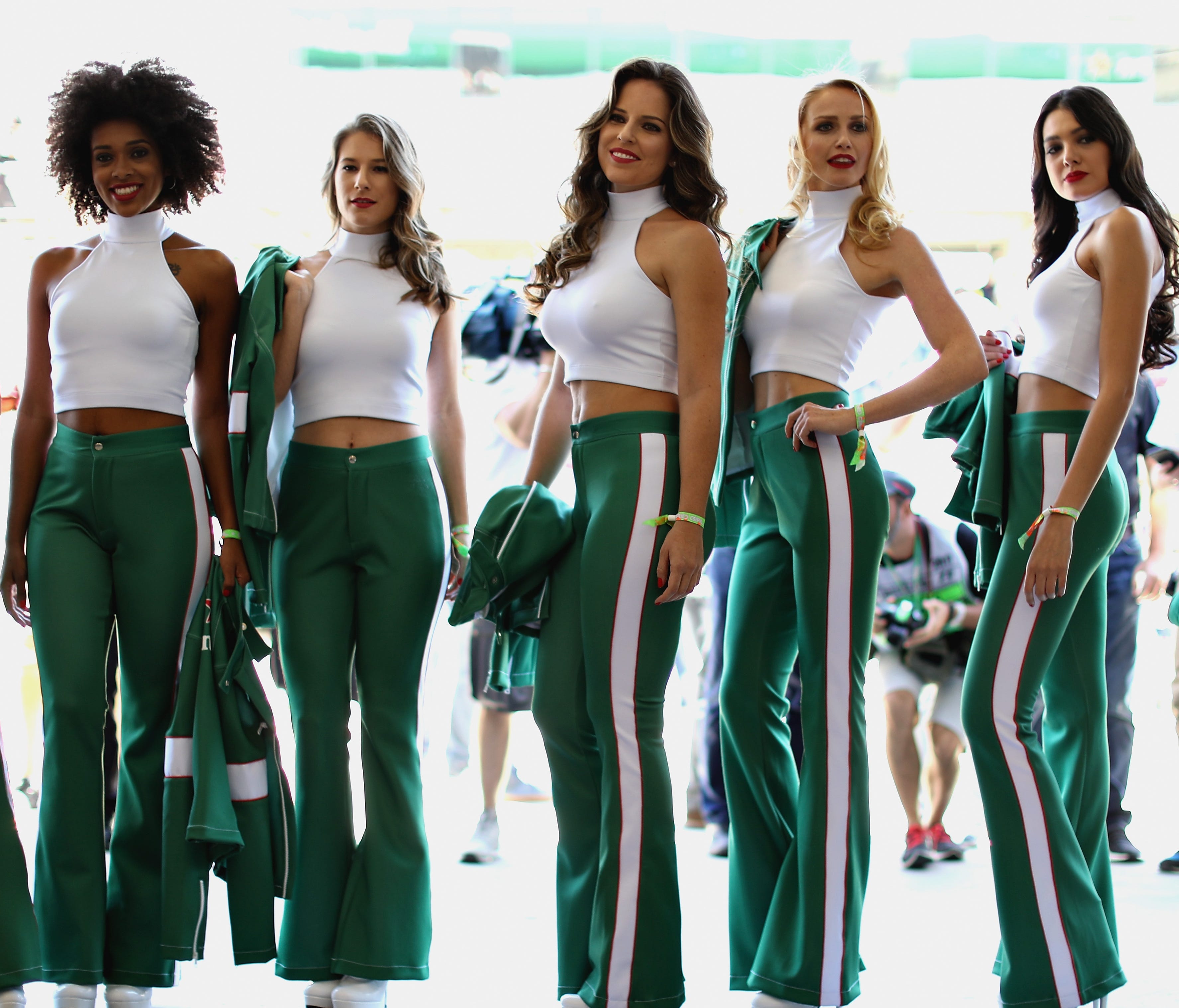 Formula One grid girls pose for a photo before the 2017 Brazilian Grand Prix.