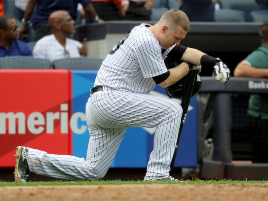 Todd Frazier reacts after a child was hit by a foul