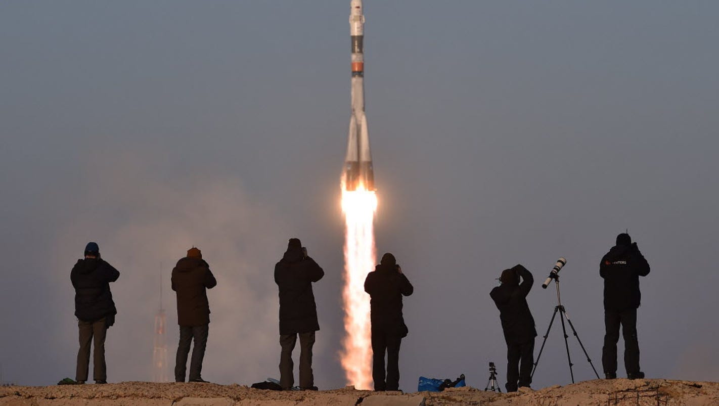 U.S., British, Russian astronauts blast off for space station