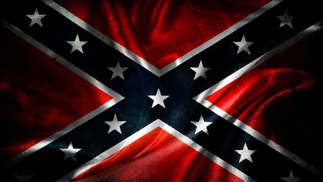 Getty Images/iStockphoto
Closeup of grunge silky Confederate flag