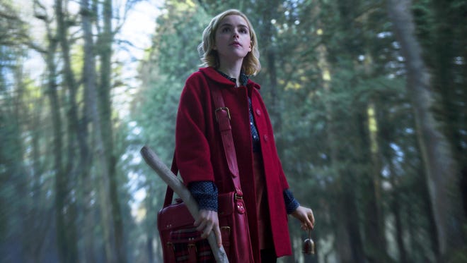 This image released by Netflix shows Kiernan Shipka in a scene from "Chilling Adventures of Sabrina," premiering on Oct. 26.